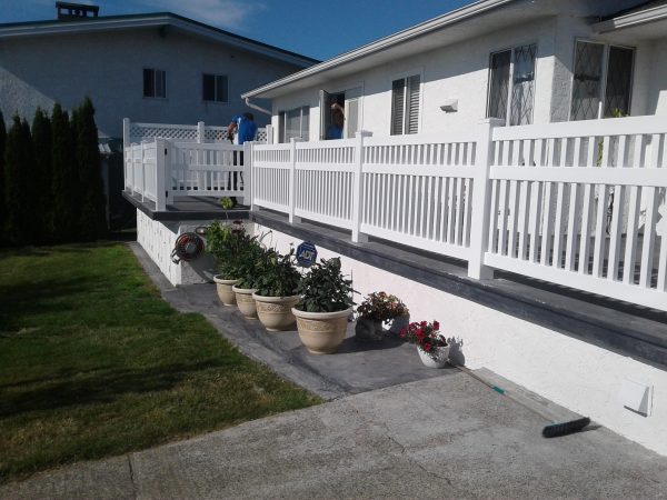 Clearbrook vinyl pool fence encasing a patio
