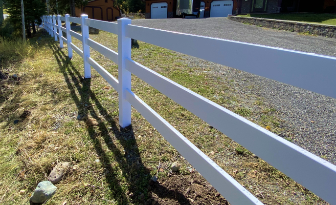 El Dorado 3 vinyl fence on a property line